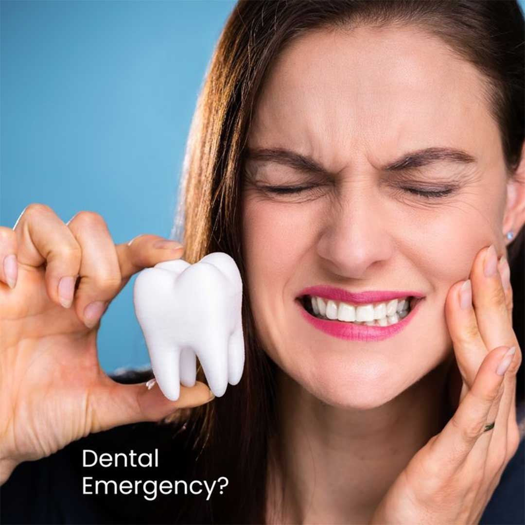 A patient receiving urgent care for severe tooth pain from an emergency dentist in Oceanside CA.