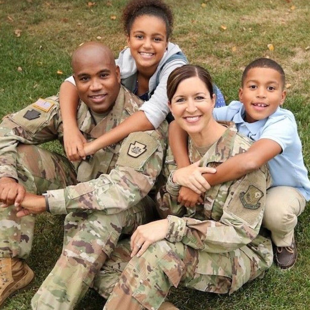 A military family visiting a dentist near Oceanside that accept TRICARE for their annual checkup.